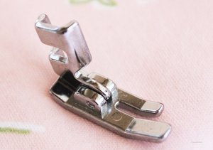 Brand new, replica standard straight-stitch presser foot just like the ones included with most all vintage Singer Sewing Machines.
